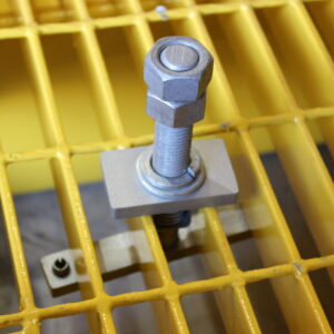 close-up hold down bolt of a steel pallet
