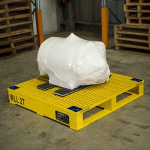 equipment covered with vci cover on a steel pallet