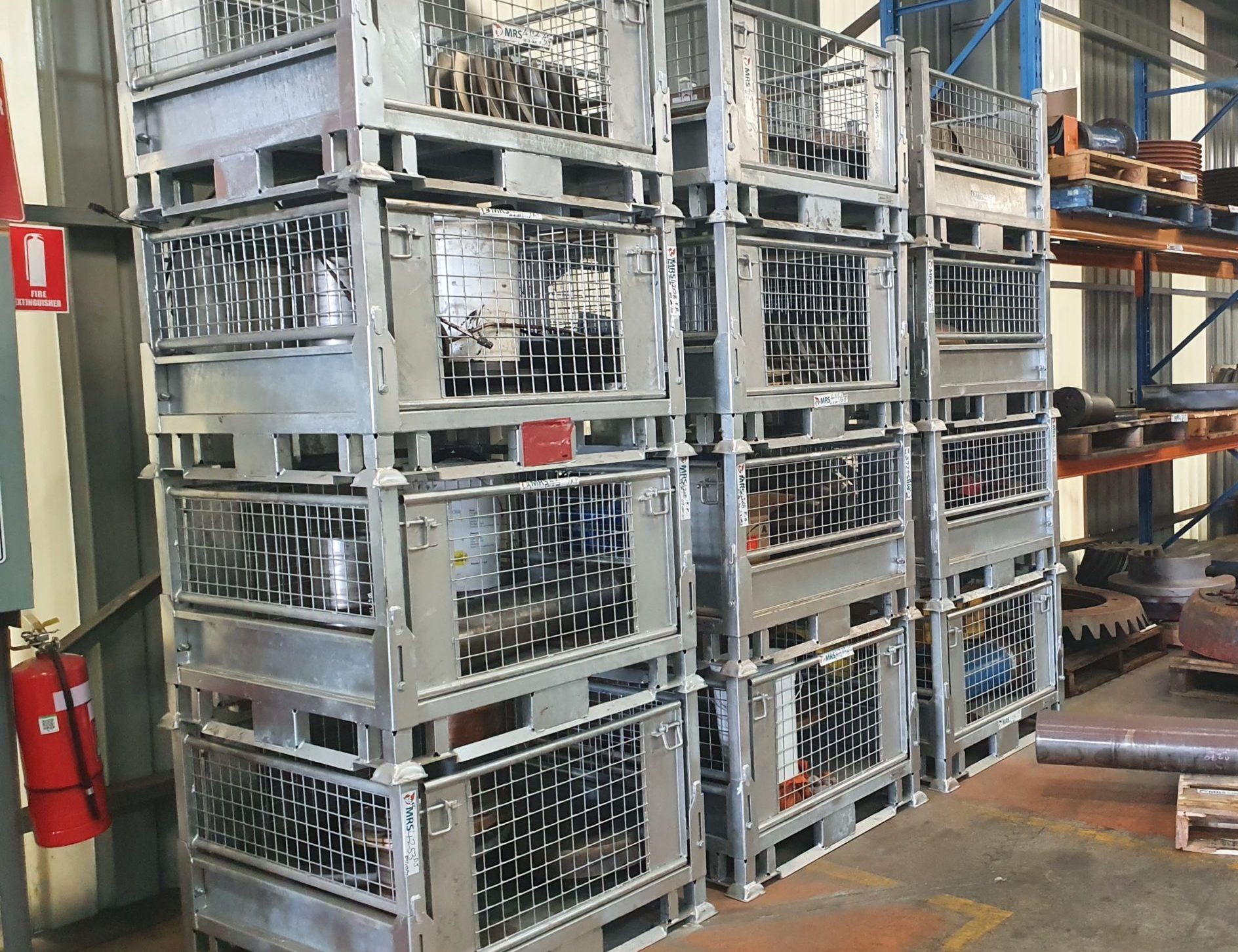 steel pallet cages in warehouse