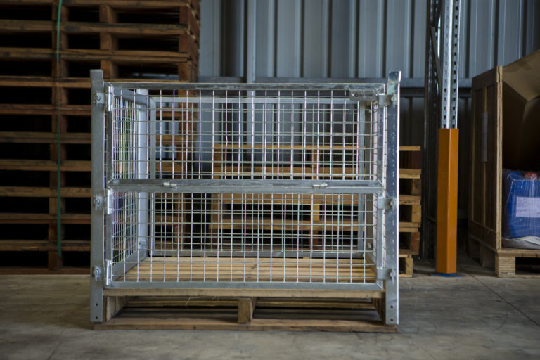 steel pallet cage on top of wooden pallet