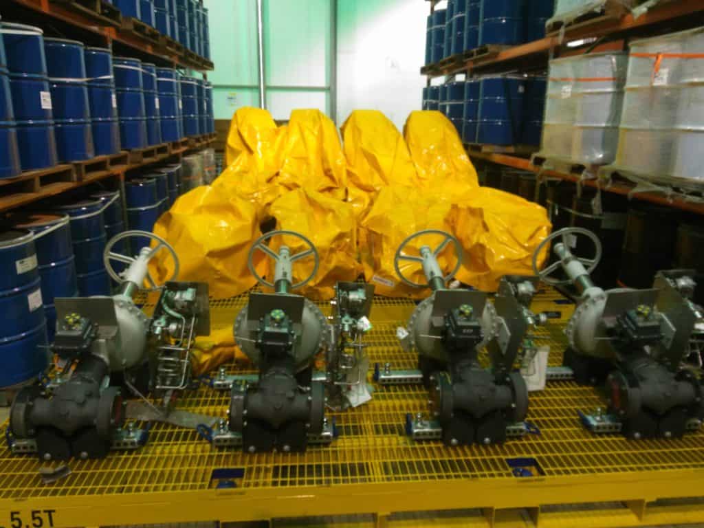 valves with reusable covers on a steel pallet