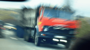 blurred image of a truck