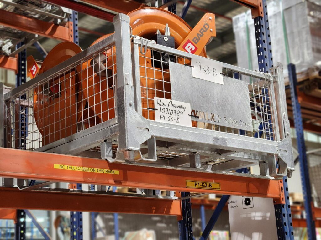 Daywalk steel cage holding a component