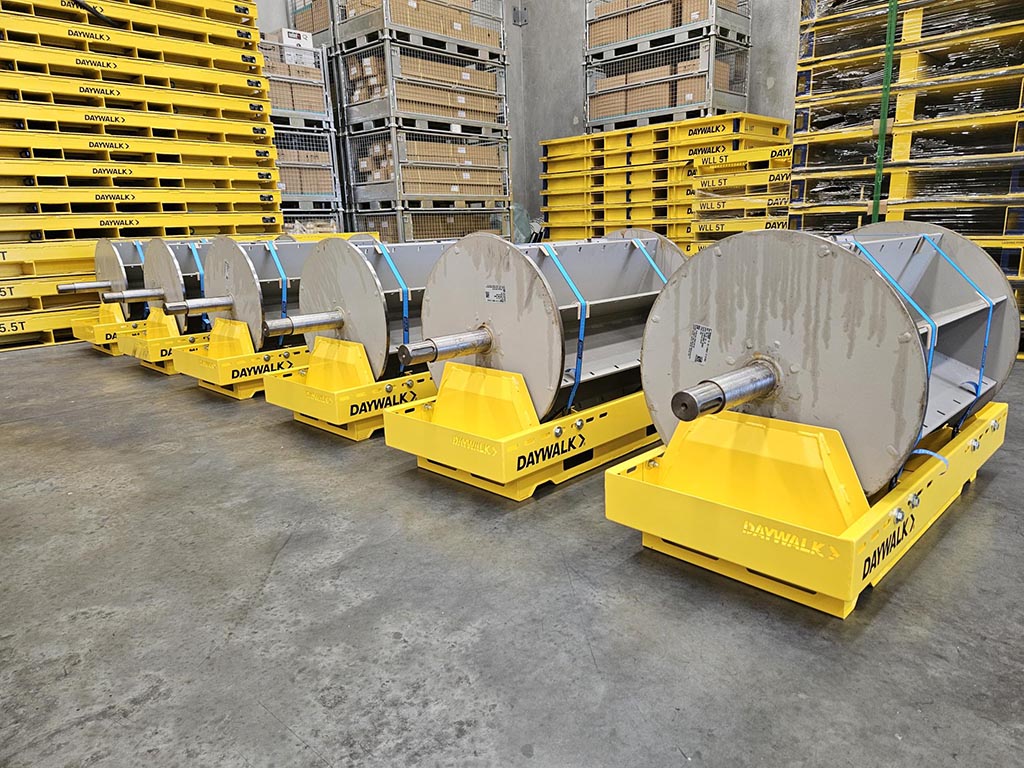 weir rotors stored on crates in a warehouse