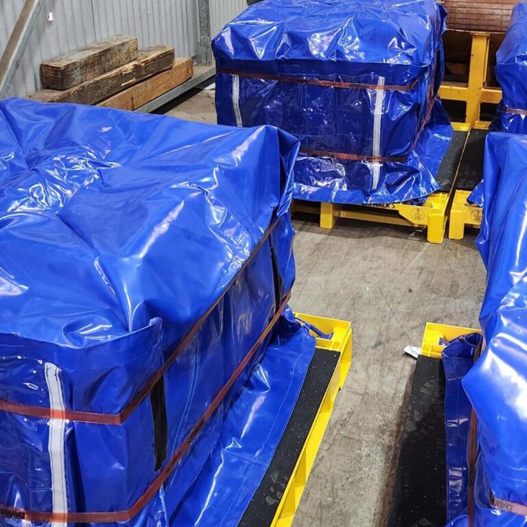 DAYWALK blue reusable covers on caged and pallets goods