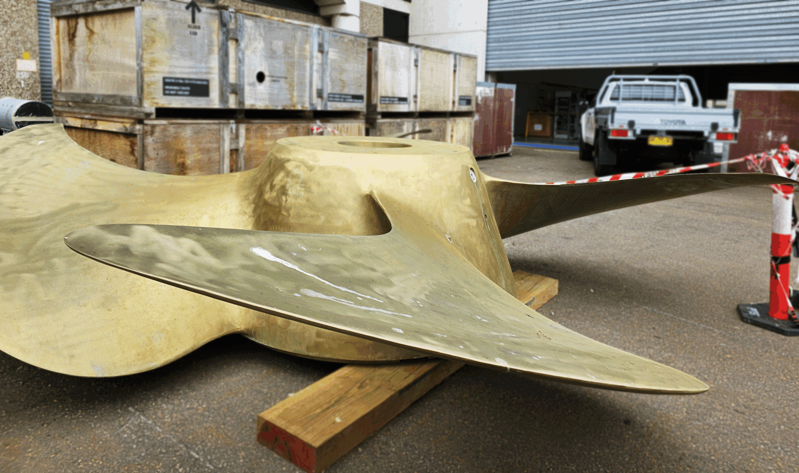 A ship propellor left on the on concrete