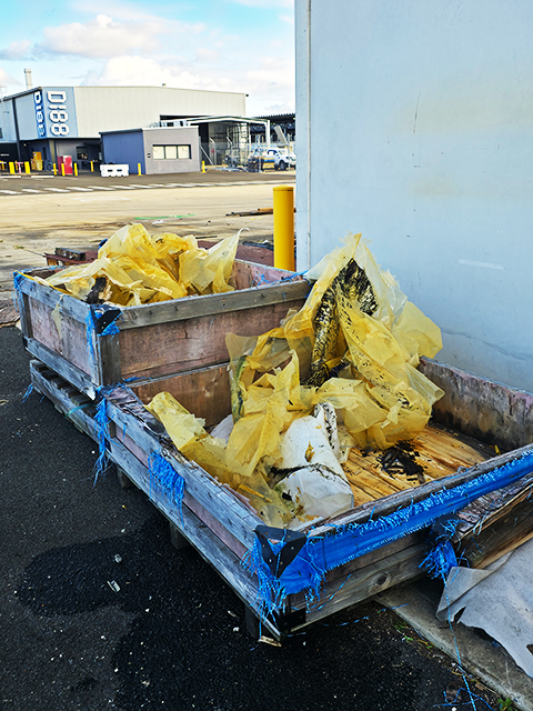 broken boxes that were holding a propellor