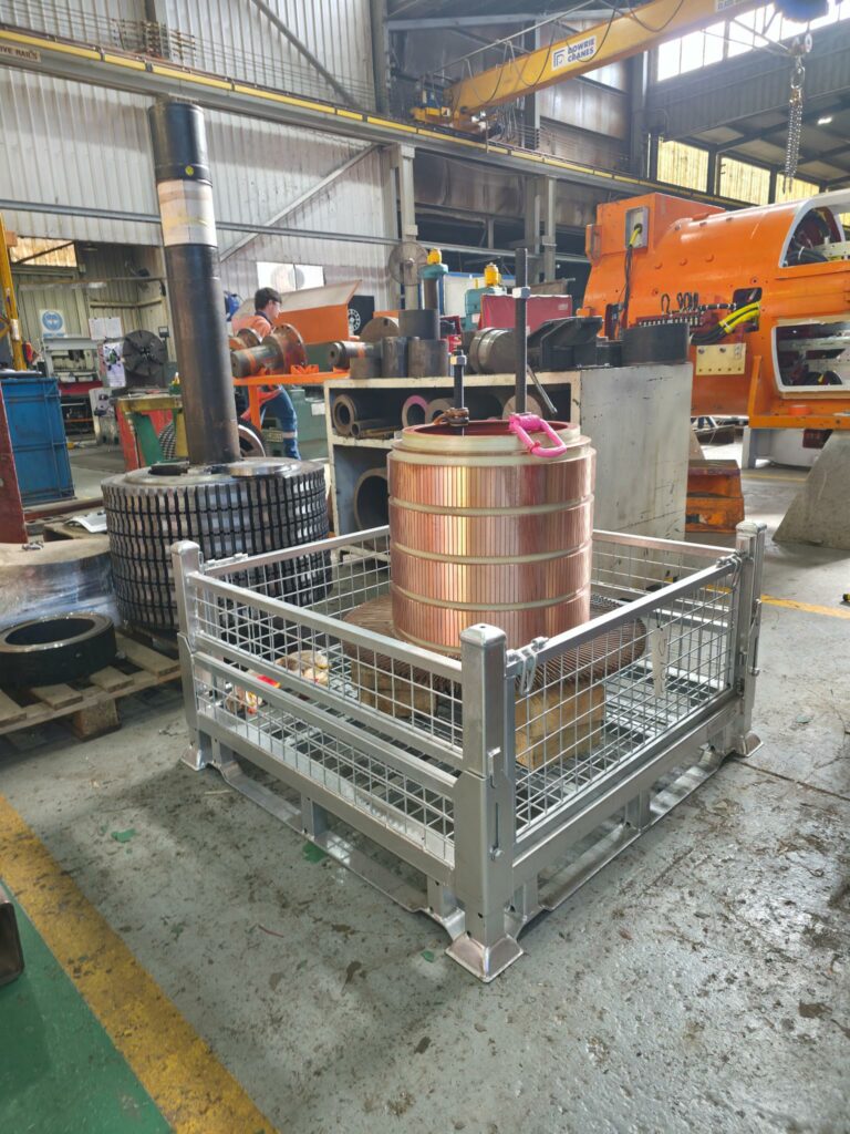 Components in cage at workshop.