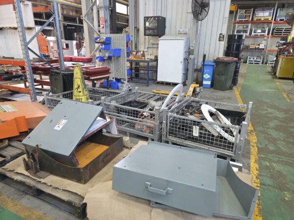 Various workshop items and components in DAYWALK cages