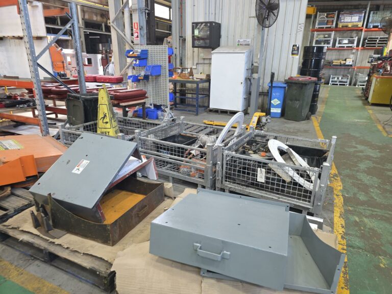 Various workshop items and components in DAYWALK cages