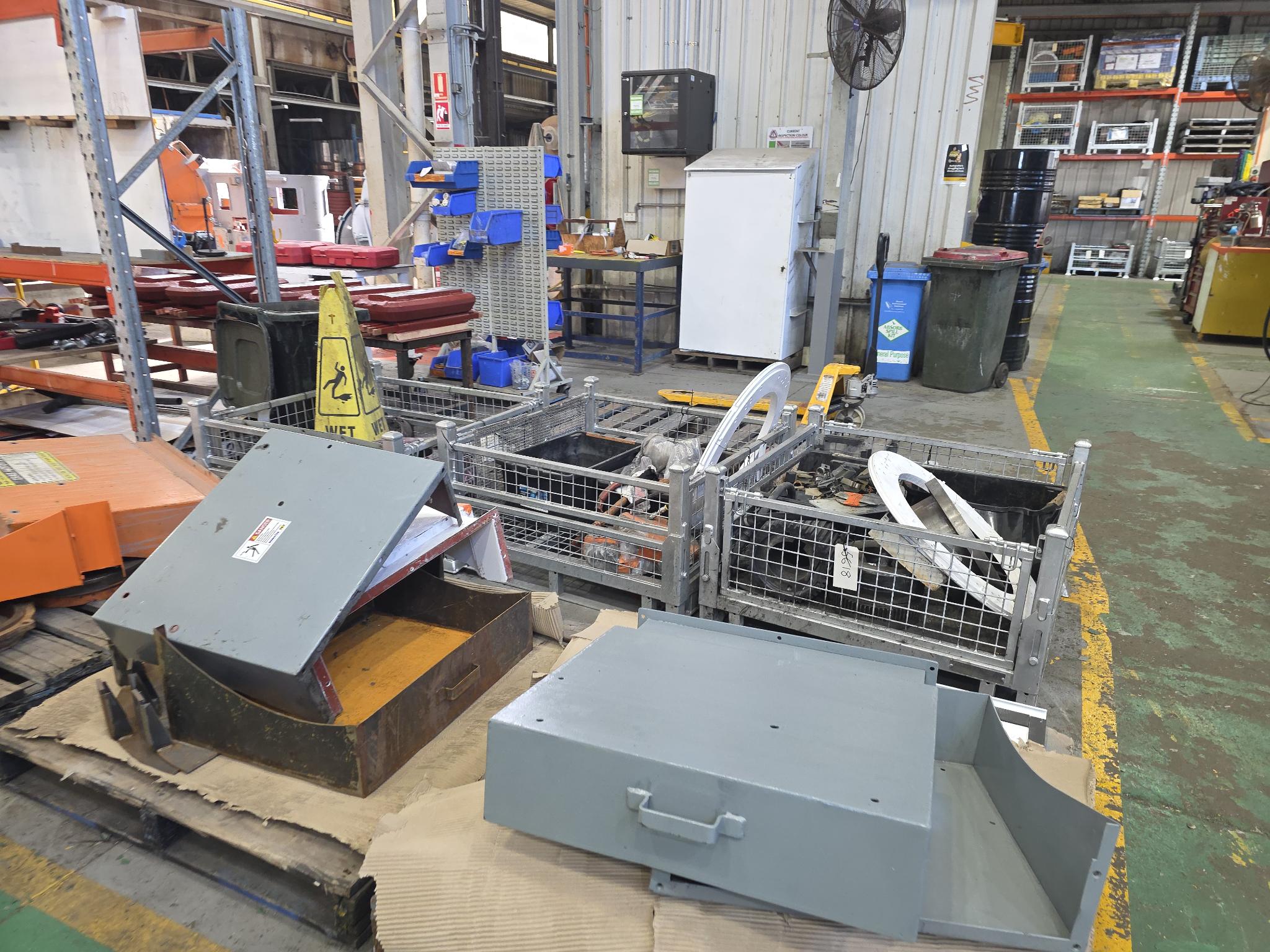 Various workshop items and components in DAYWALK cages