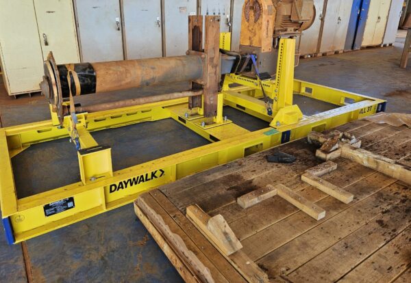 A DAYWALK frame supporting a pump in a workshop environment.